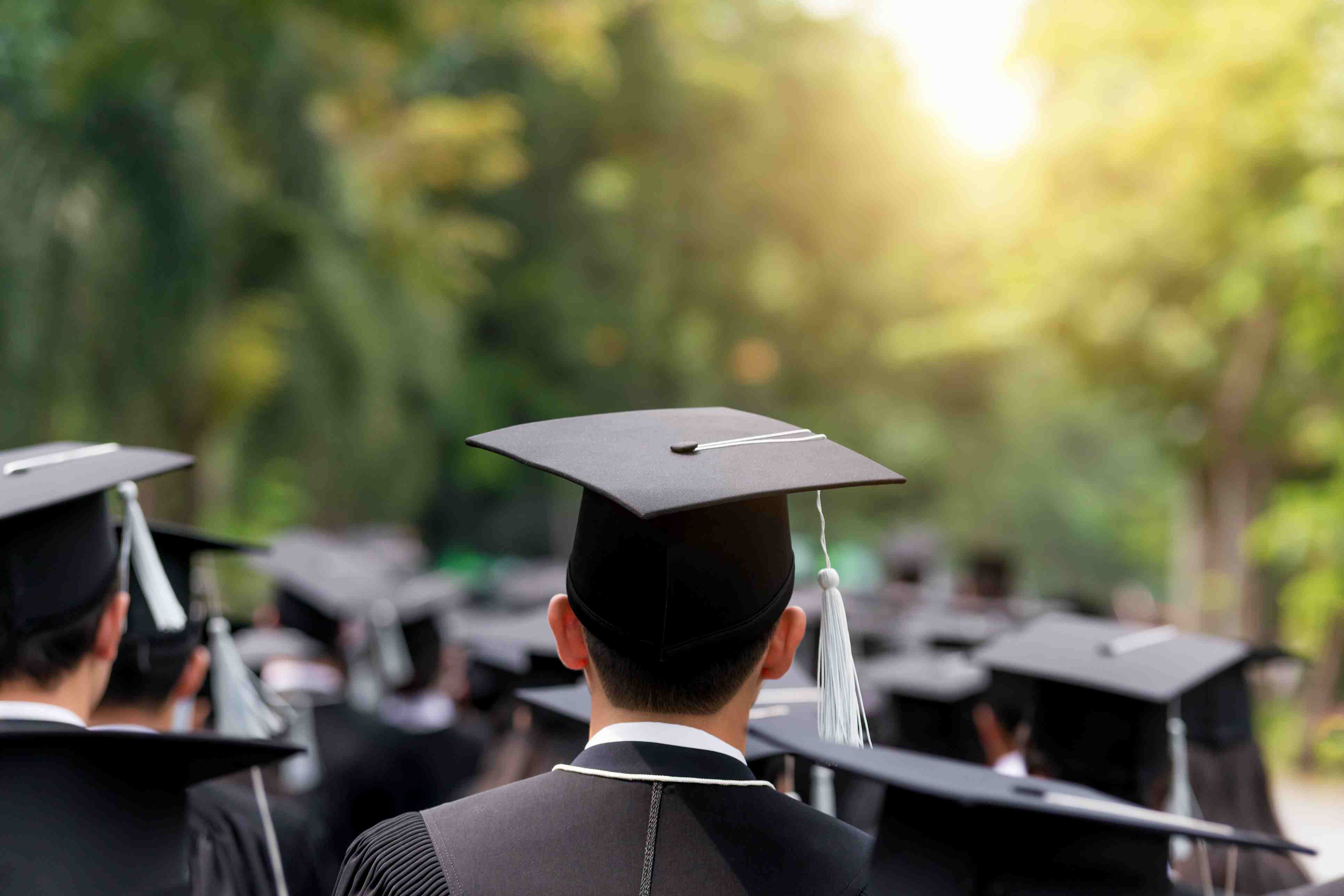 back-of-graduates-during-commencement-at-university--close-up-at-graduate-cap-855832316-5a99dada18ba0100375a44ef.jpg