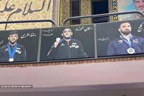 عکس مدال آوران پاریس در خانه کشتی شهید هادی نصب شد