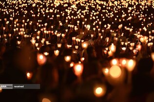 زائران در مراسم جشن شخصیت حضرت فاطمه(س) در زیارتگاه روستای فاطیما، پرتقال