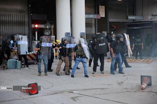 درگیری پلیس ضد شورش و معترضان در لس‌آنجلس آمریکا