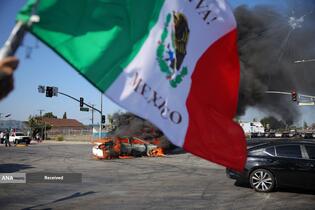 درگیری پلیس ضد شورش و معترضان در لس‌آنجلس آمریکا