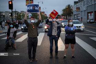 درگیری پلیس ضد شورش و معترضان در لس‌آنجلس آمریکا