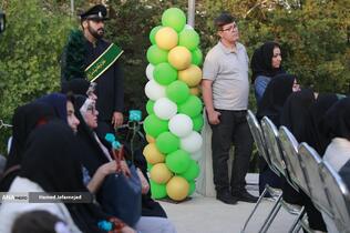 اهتزاز بزرگترین پرچم علوی بر فراز تهران