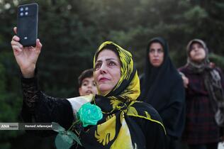 اهتزاز بزرگترین پرچم علوی بر فراز تهران