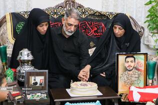 دیدار خادمیاران رضوی با خانواده شهید علیرضا قنبری