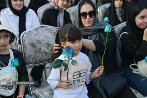 اهتزاز بزرگترین پرچم علوی بر فراز تهران