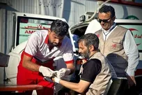 خدمت بی‌چشم‌داشت امدادگران در گرمای داغ اربعین