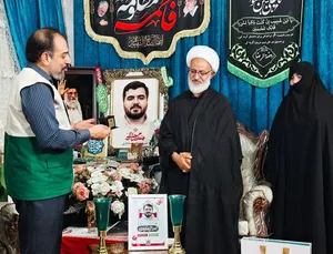 تکریم خانواده شهید علی خدادادی 