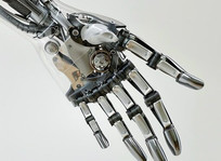 Chinese Scientists Develop a Robotic Arm with Human-Like Tactile Sensing