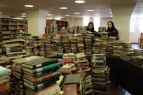 انجام فرآیند رف‌خوانی ۱۲۵ هزار نسخه کتاب در کتابخانه ملی ملک