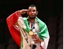 قهرمان جهان کوراش مدال خود را به زندانیان جرائم غیر عمد اسفراین اهدا کرد