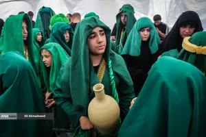 آیین خیمه سوزان عاشورا در چهارراه گلوبندک تهران
