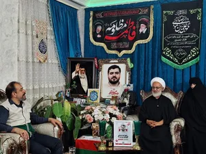 تکریم خانواده شهید علی خدادادی 