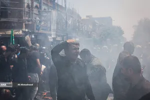 آیین خیمه سوزان عاشورا در چهارراه گلوبندک تهران
