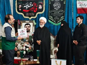 تکریم خانواده شهید علی خدادادی 