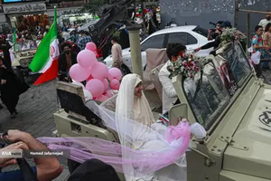 مراسم جشن عروسی زوج های جان فدا همزمان با سالروز ازدواج حضرت زهرا و حضرت علی در میدان امام حسین