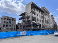 دیدار رئیس فدراسیون تنیس روی میز با مادر شهید حدادگر شهید جنگ رمضان
